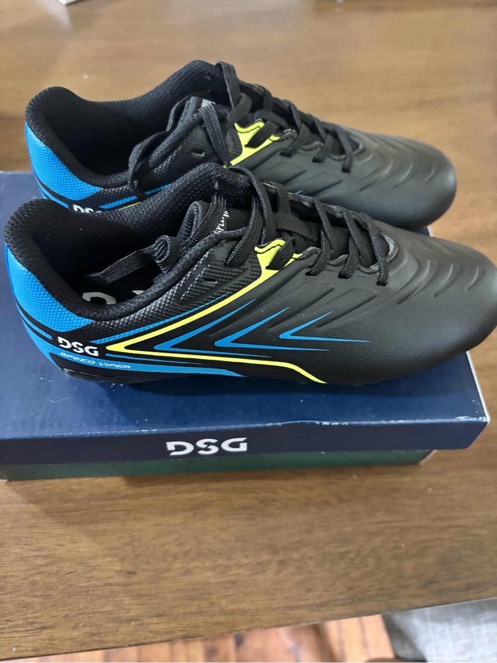 DSG boys cleats with Blue & Yellow Accents